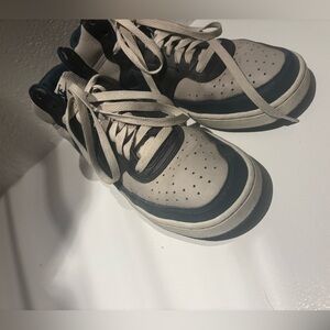Dark navy and gray Nikes